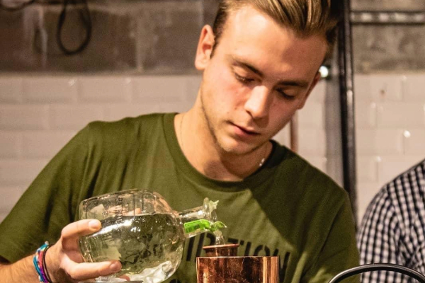 Carlo Insonne crafting a cocktail